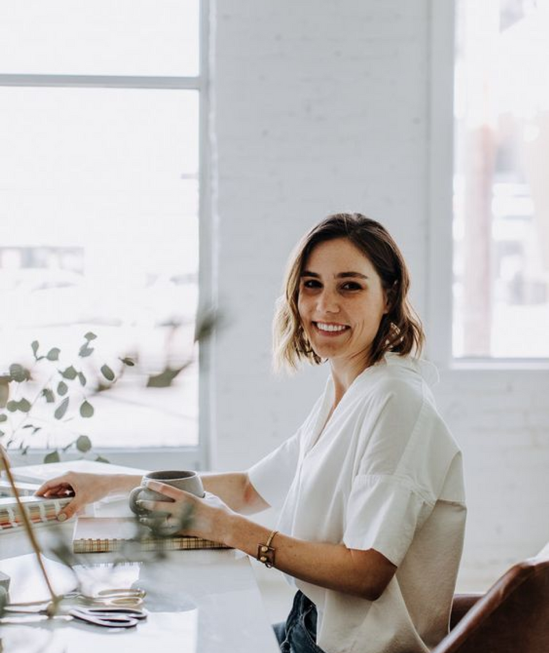 Woman sitting at business desk